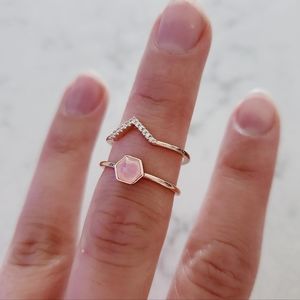 Oomiay Gemandi rose gold plated ring set. Rose quartz crystal and white crystals